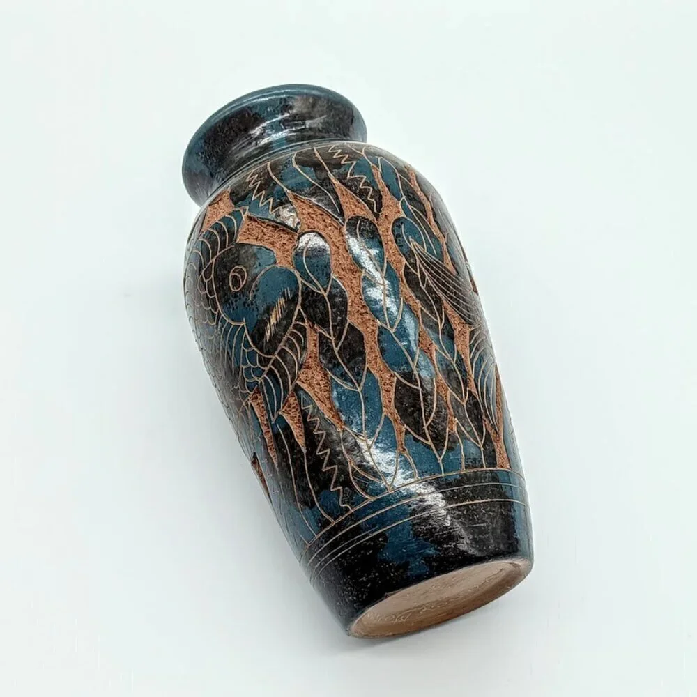 Handmade no carved signed